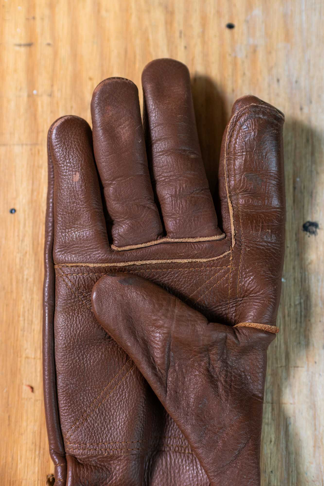 Golden Stag cowhide work glove, palm detail showing creases from real wear
