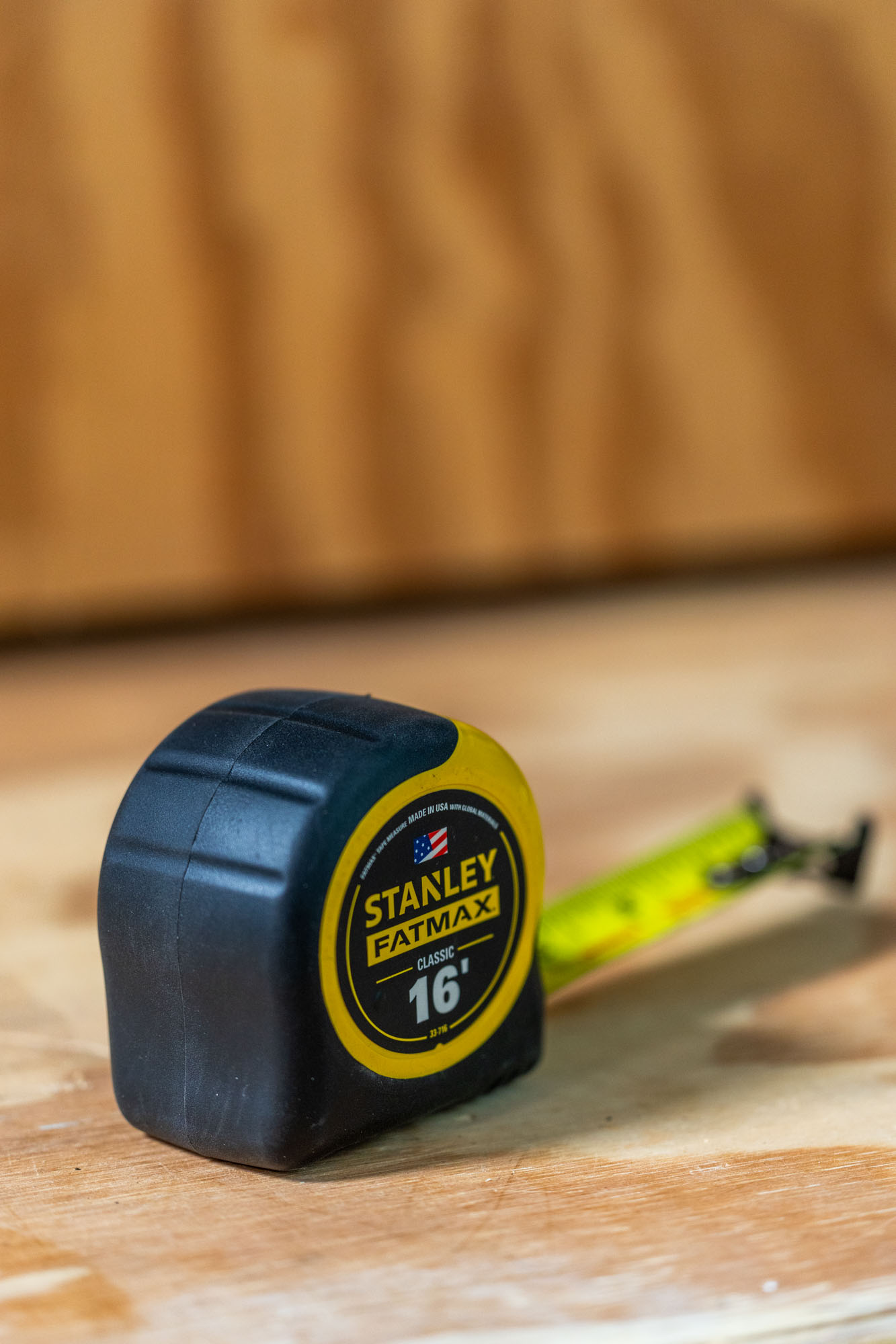 Stanley FatMax tape measure, angled with blade partly extended